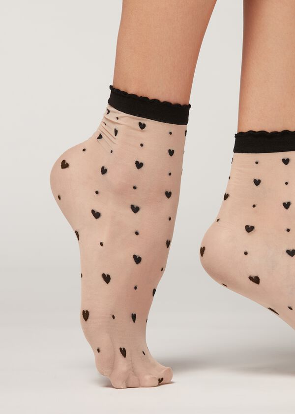 Transparente Socken mit romantischem Muster