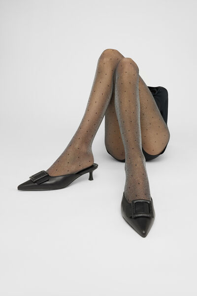 Transparente Strumpfhose mit Glitzer und Punkten Frau