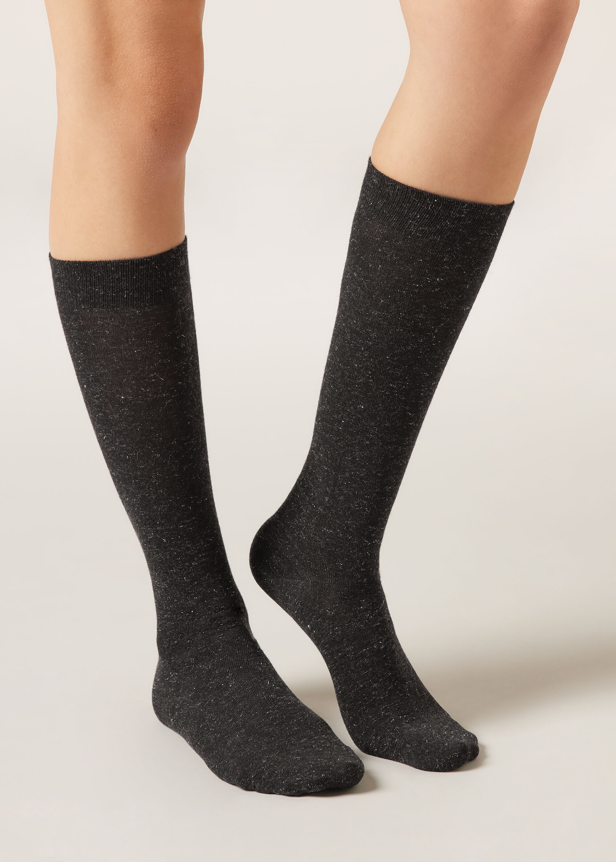 Chaussettes hautes en cachemire et avec paillettes
