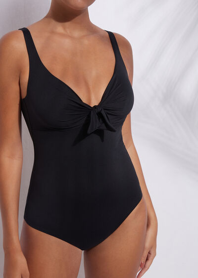 Hecho de Existencia Tantos Bañadores enteros y trikinis de mujer | Calzedonia