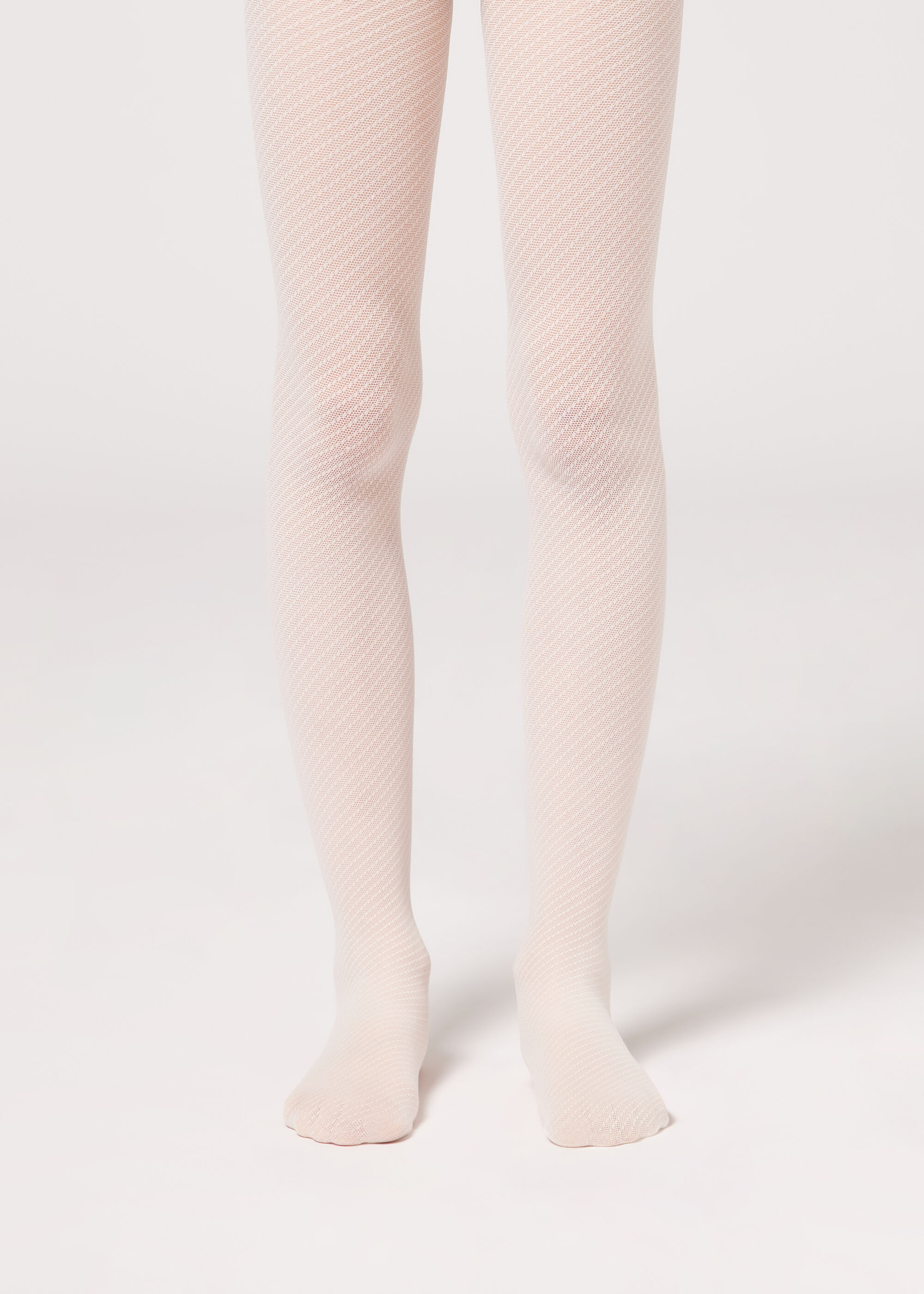 Collant résille 50 deniers à motifs pointillés pour fille