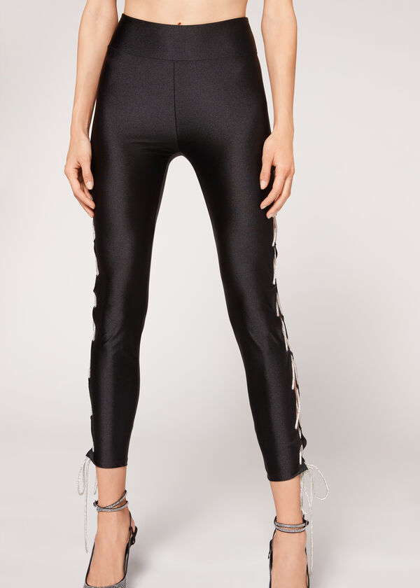 Hochglänzende Leggings mit geflochtenem Brillant-Band